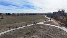 Aerial view of group of people walking along High Line Canal trail