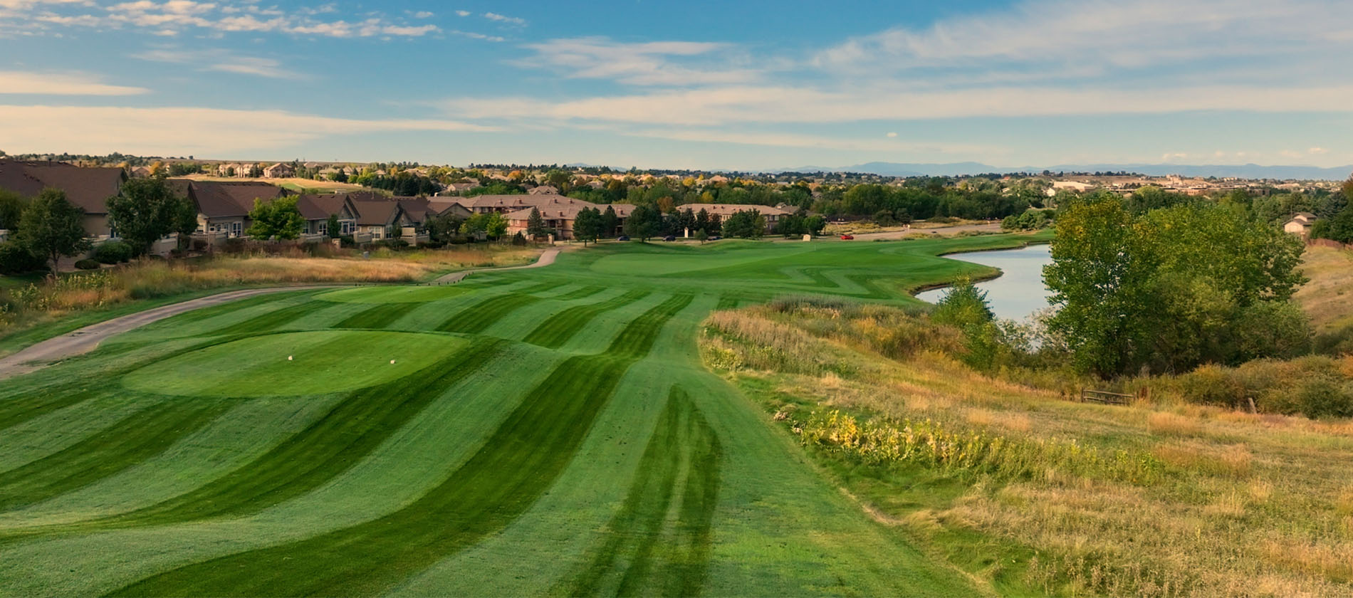fairway at Saddle Rock Golf Course with water on right side