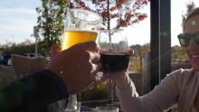Two glasses toasting together that links to the May 2024 edition of the video program Connected Colorado