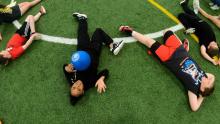 Homeschool kids stretching at Southeast Recreation Center Fieldhouse