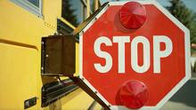 Stop sign on school bus