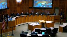 Aurora City Council Chambers that links to the September 9, 2024 meeting of the Aurora City Council.