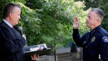 Todd Chamberlain being sworn in as Aurora Police Chief