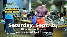 Mini-con text information on screen with image from event behind
