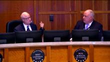Aurora Mayor and Aurora City Attorney sitting at the dais in the Council Chambers linking to the City Council meeting of Oct. 28, 2024