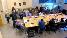 City Council and staff meeting in the Aurora Room at the Aurora Municipal Center that links to a video recording of the meeting.