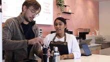 Coffee workers making a drink