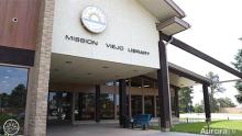 exterior of Mission Viejo Library with sign
