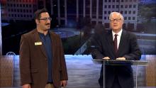 Mayor presenting proclamation in AuroraTV studio