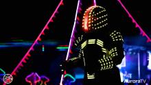 Person dressed as a robot with lights on the costume