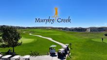 Aerial shot of Murphy Creek golf course with logo in the sky
