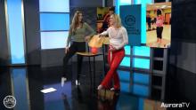 Two women working out in news studio