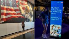 Sam Fuller posing in front of NASA signs