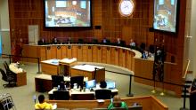 Council chambers during a city council meeting.