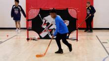 Kid during Hockey Without Boundaries session at Central Rec