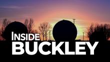 "Inside Buckley" text with radomes in background